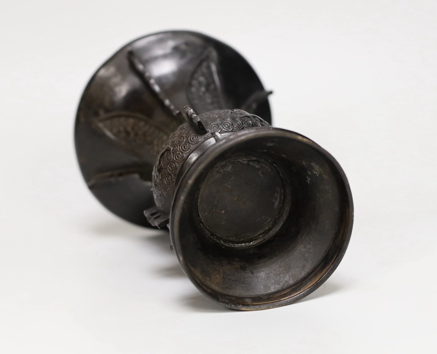 An 18th century Chinese bronze gu vase. 18cm high